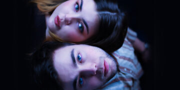Norwegian sibling duo Hella the Movie lying down together.