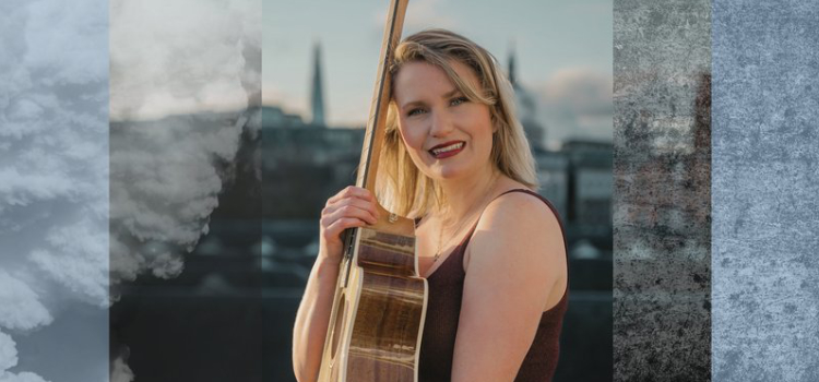 Swedish singer holding a guitar